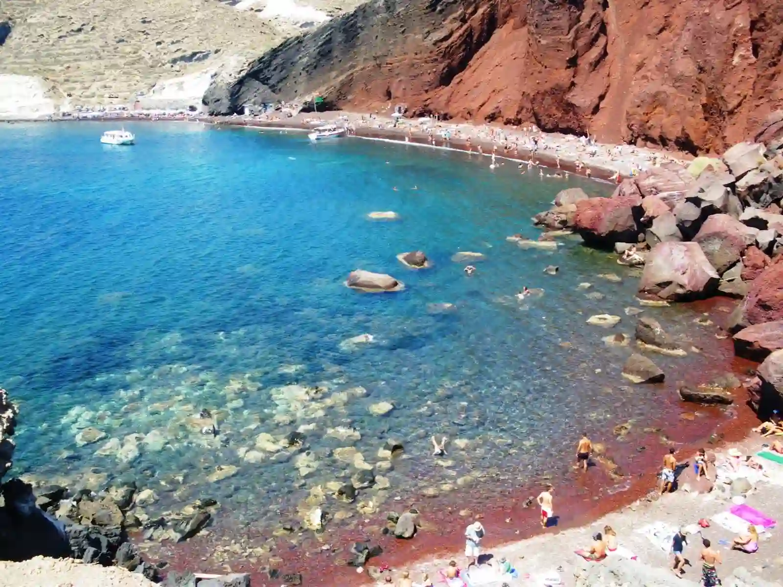 Swimming at red beach Greece