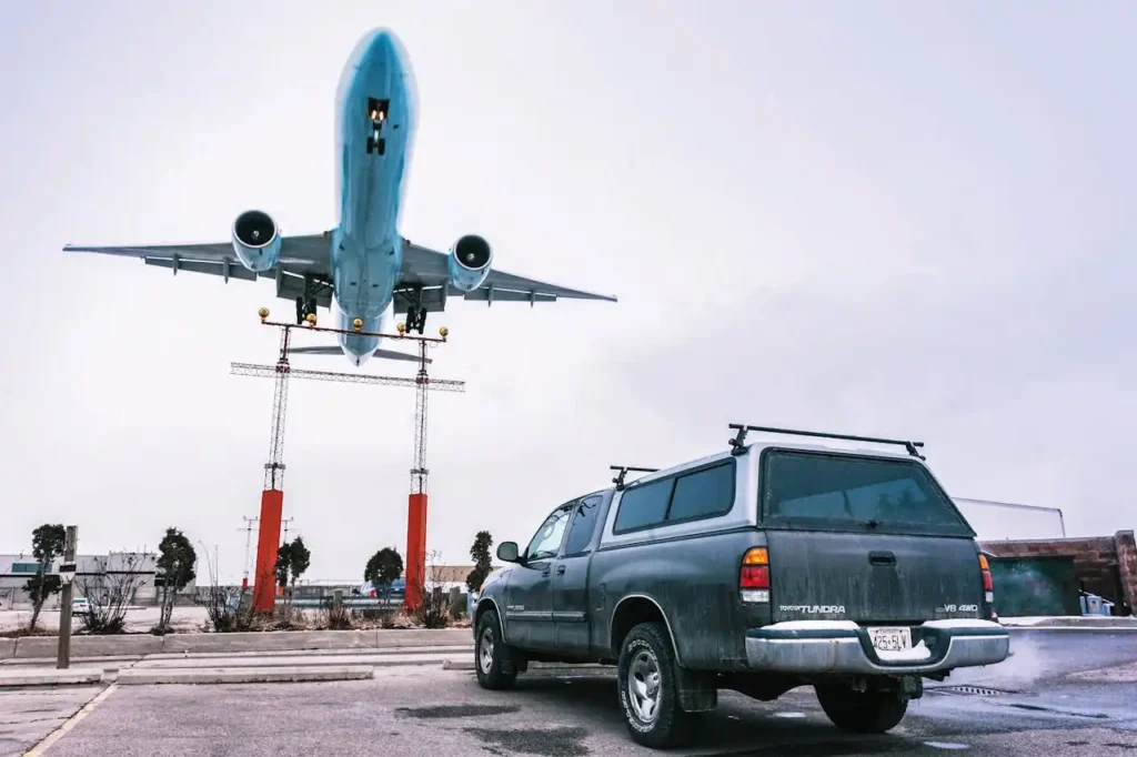 10 Reasons to Book your Next Journey with GetTransfer.com 2 Airplane in Flight over Pickup Truck