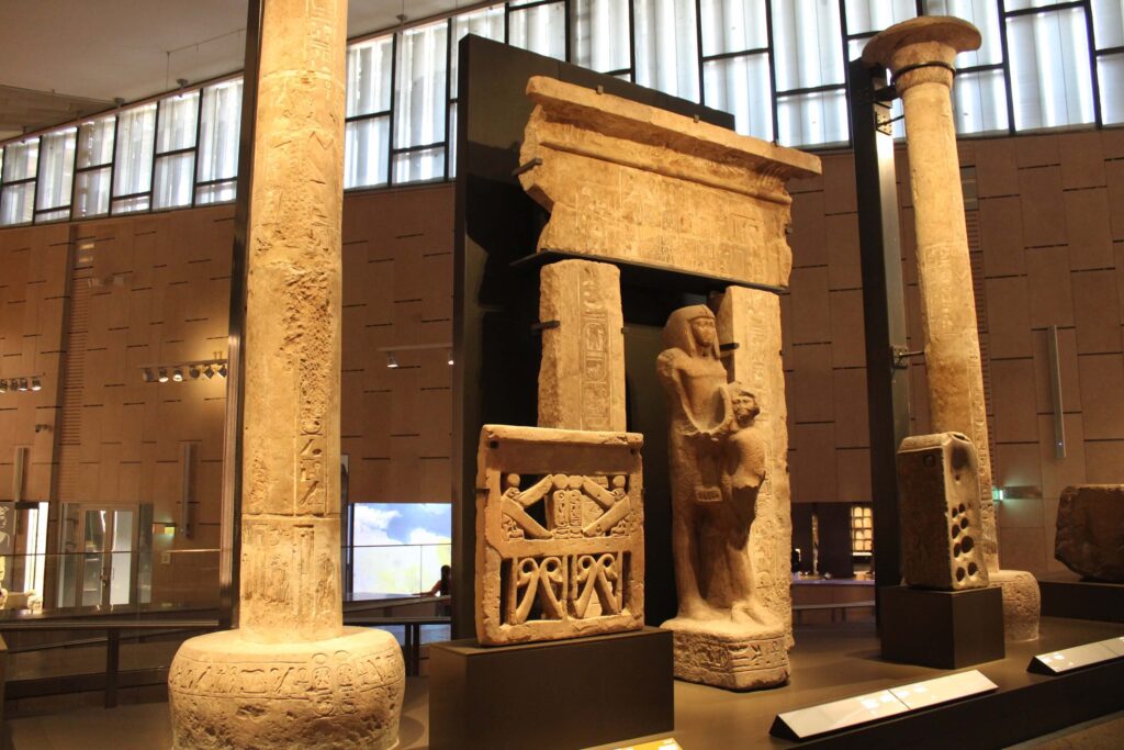 Temple entranceway and statues on display at the Grand Egyptian Museum
