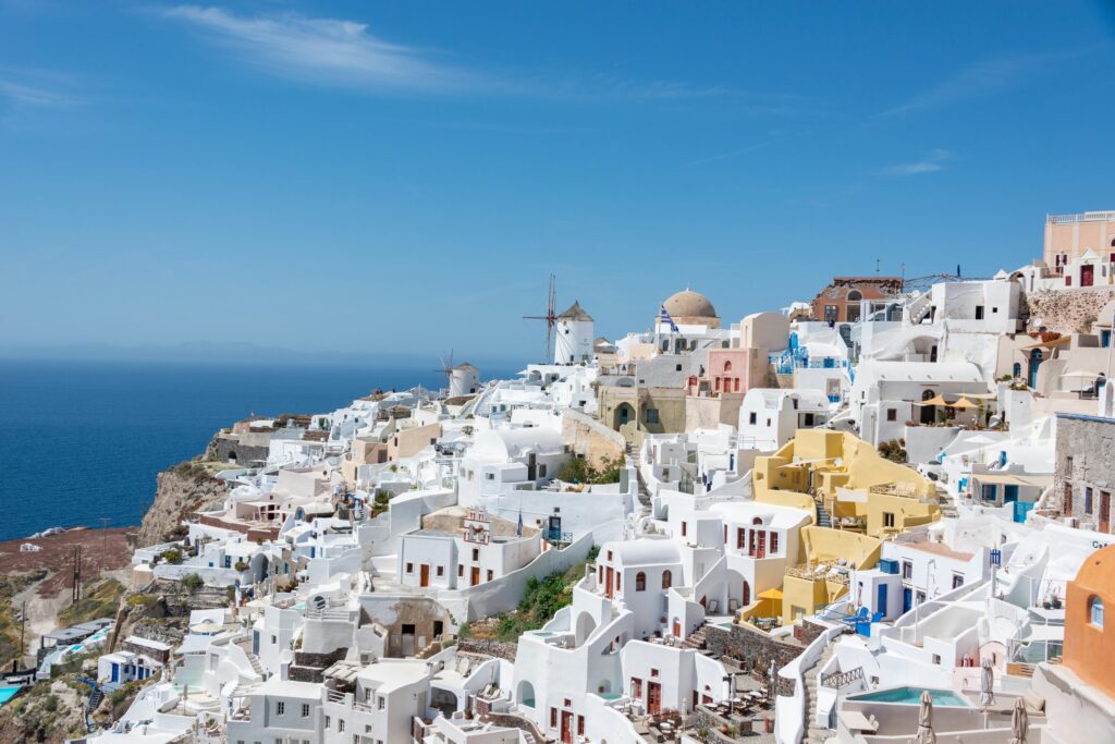 Looking at the views in Fira Santorini, 3 day Santorini itinerary