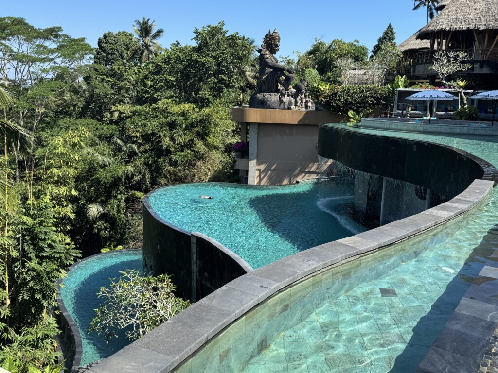 Best honeymoon Resorts in Bali - The Kayon Jungle Resort Ubud tiered infinity pools with lush jungle backdrop