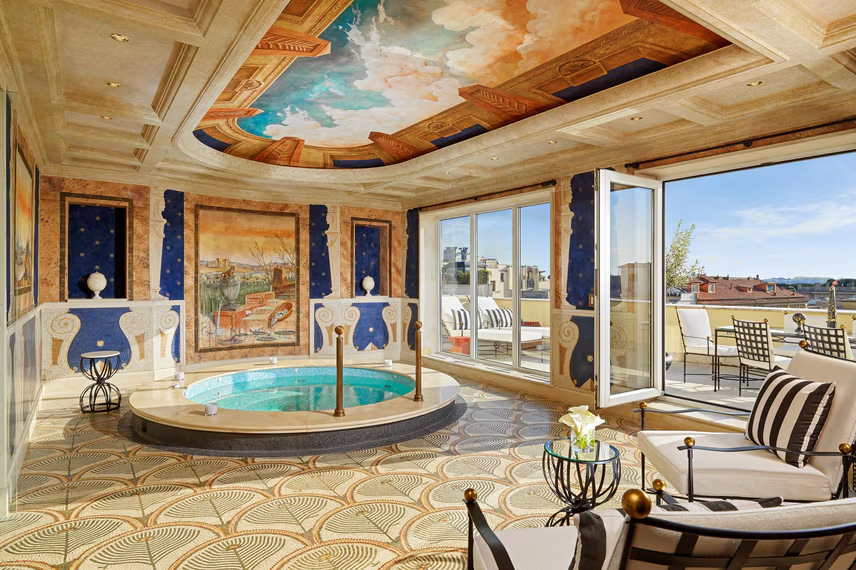 Westin Excelsior Rome suite at Marriott with indoor jacuzzi, luxury decor, and terrace overlooking the city