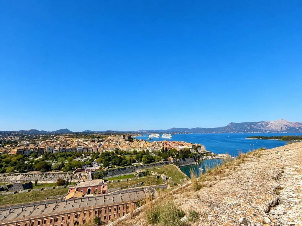 Panoramic view looking northwest from Corfu, Old Fortress over Corfu Town, the historic fortifications and the Ionian Sea.